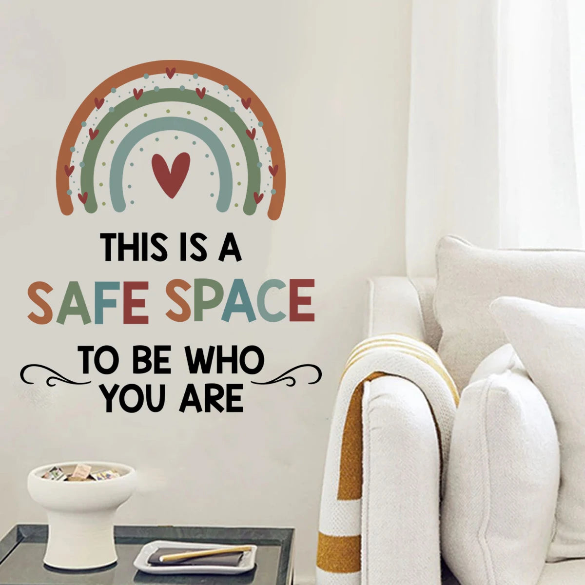Decorative wall sticker with rainbow and text in a living room setting