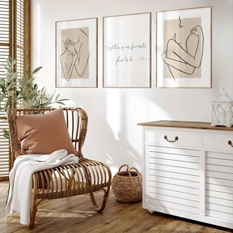Nursery room with wicker chair, white dresser, and framed artwork on the wall.