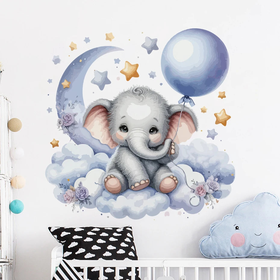 Children's room with a wall decal of an elephant holding a balloon on a cloud, surrounded by stars and a moon.