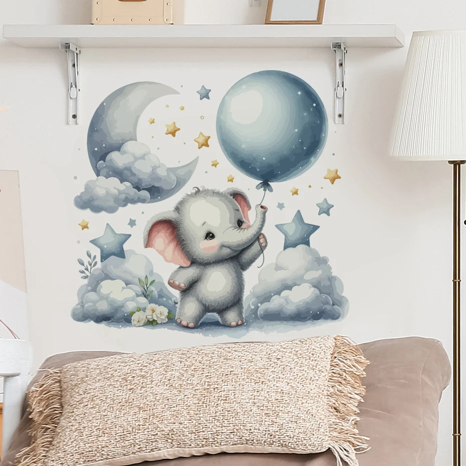 Wall decal of a cute elephant holding a balloon with stars and clouds in a bedroom setting.
