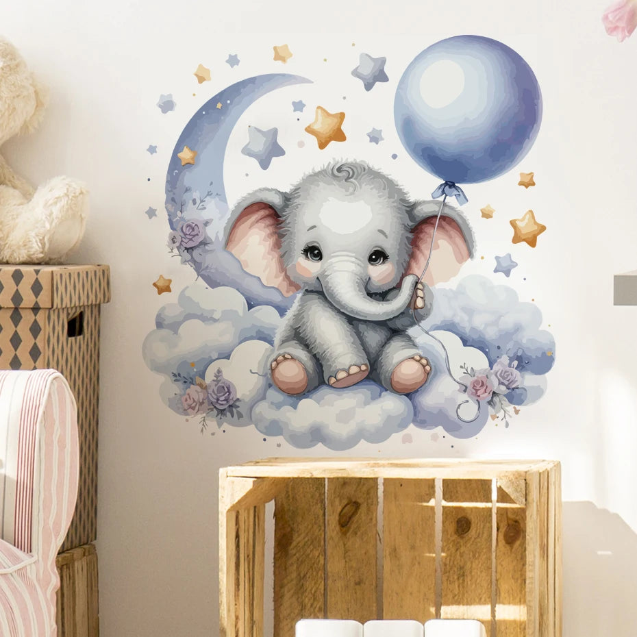 Wall decal of a cartoon elephant holding a balloon on a cloud with stars and a moon.