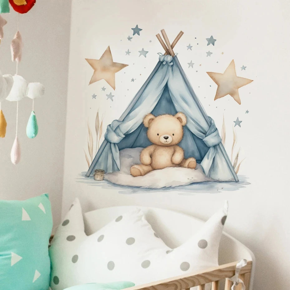 Children's room with a teddy bear in a blue teepee, star decorations, and colorful pillows.