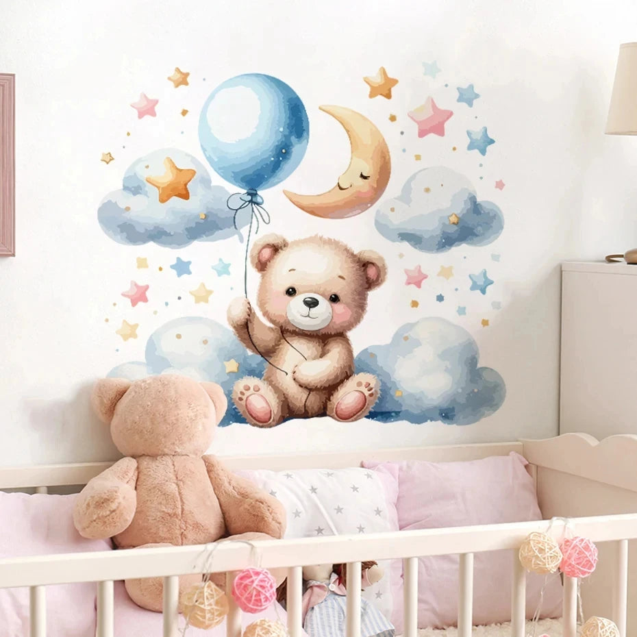 Children's room with teddy bear wall decal, balloons, and stars on a white wall.