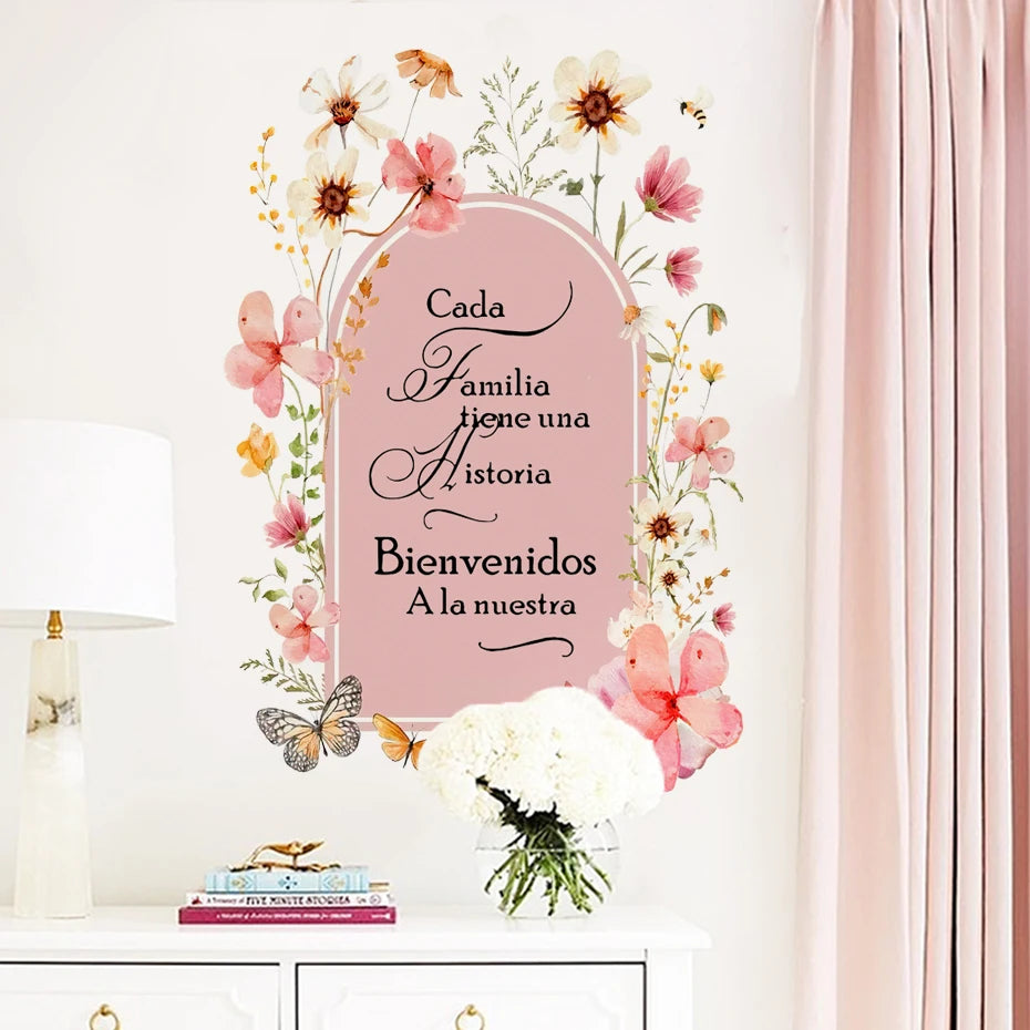 Decorative sign with floral elements and text on a white background
