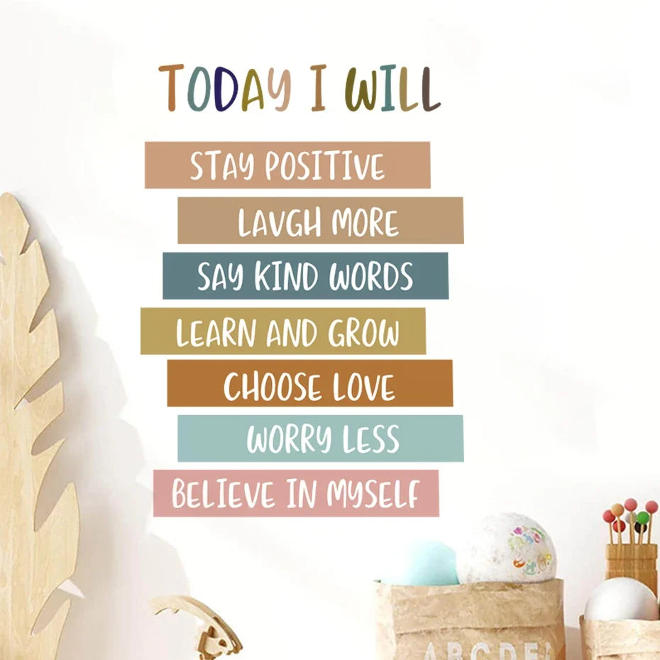 Motivational quote wall decal with colorful text on a white wall.