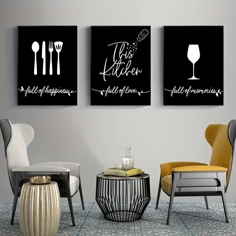 Three black framed prints with white text and symbols on a wall above a modern living room setup.