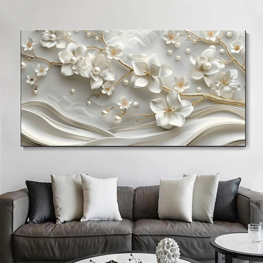 Decorative wall art with floral design above a gray sofa with patterned cushions.