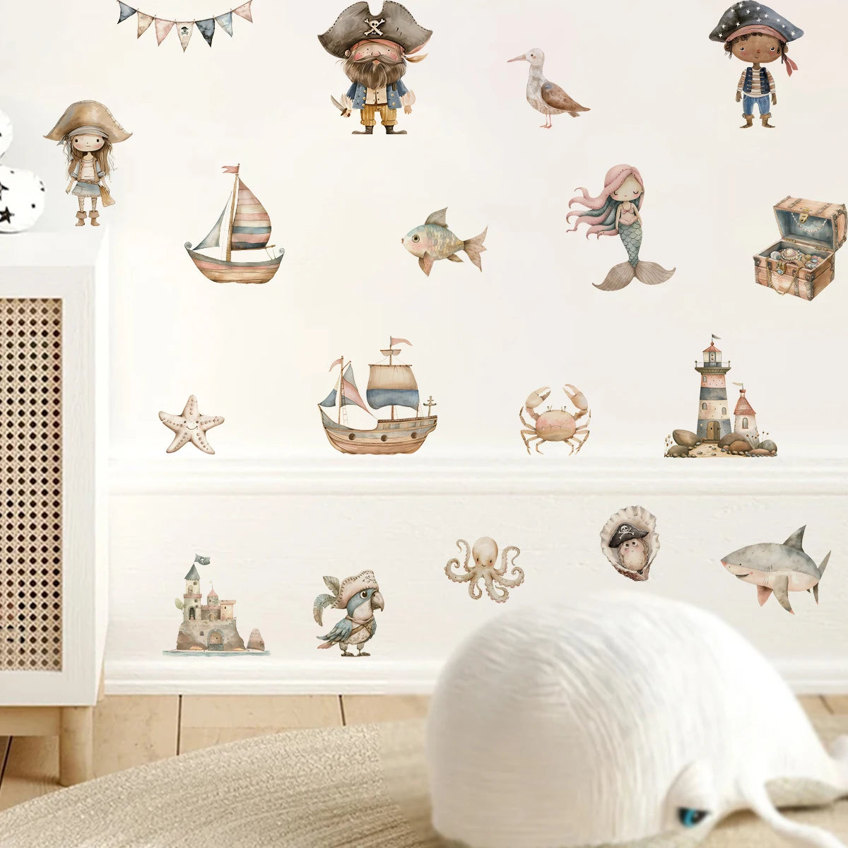 Children's room with pirate-themed wall stickers on a white wall.