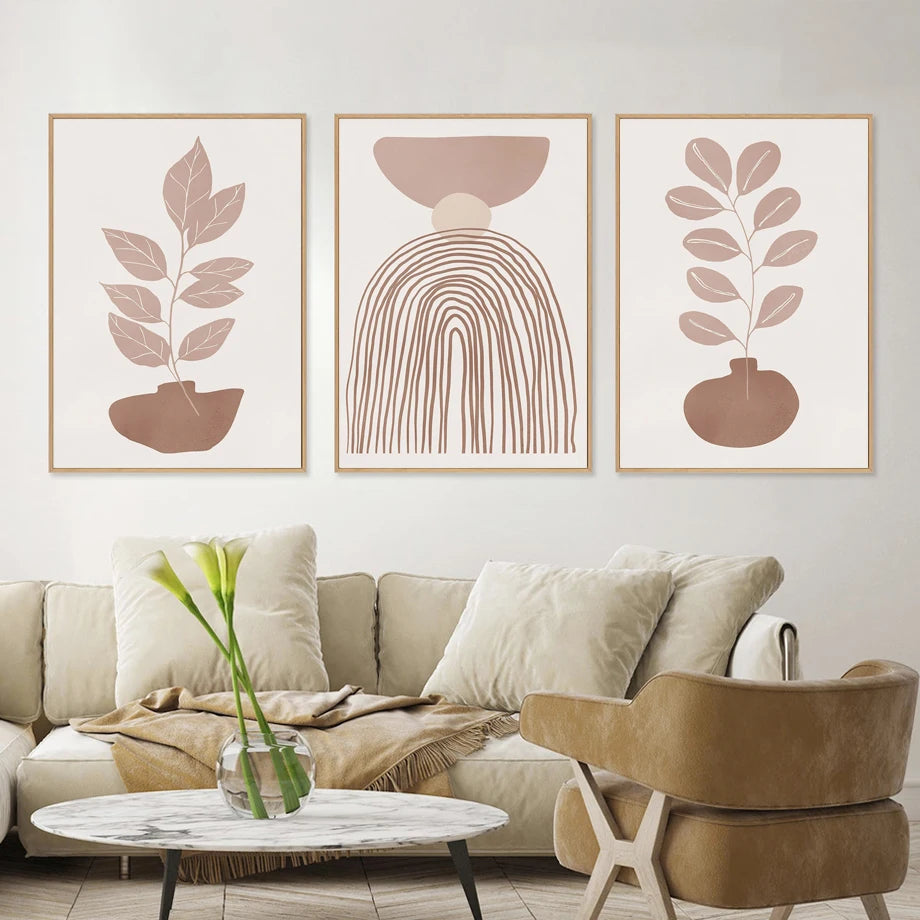 Living room with abstract wall art and a beige sofa.