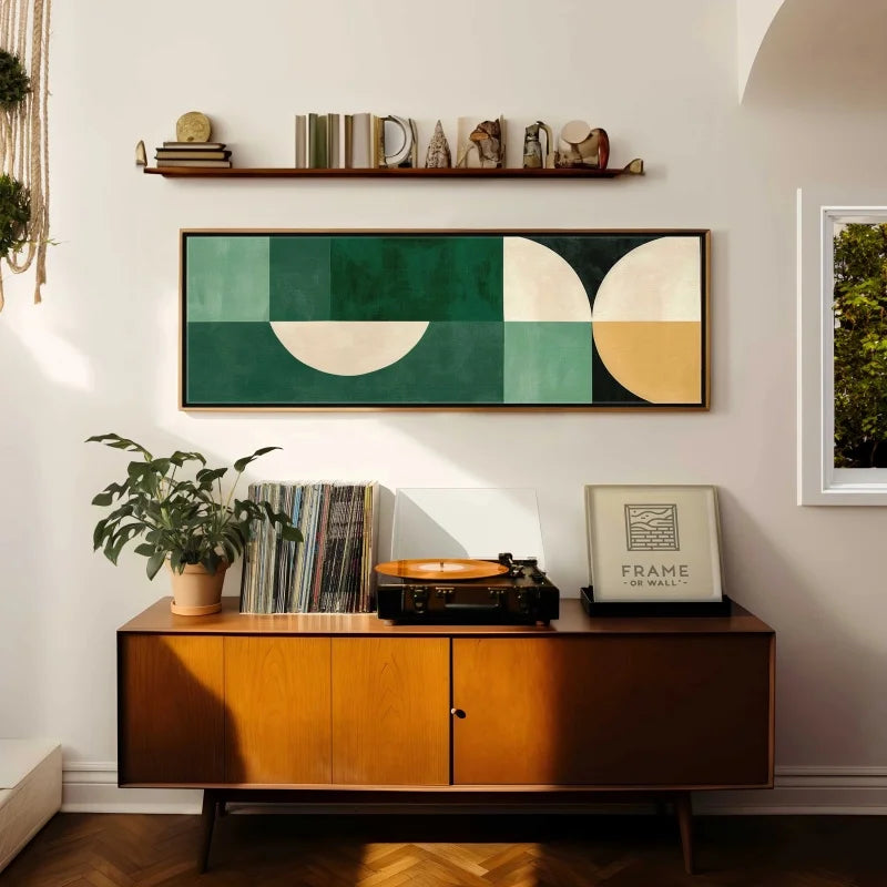 Living room with wooden cabinet, abstract art, and record player
