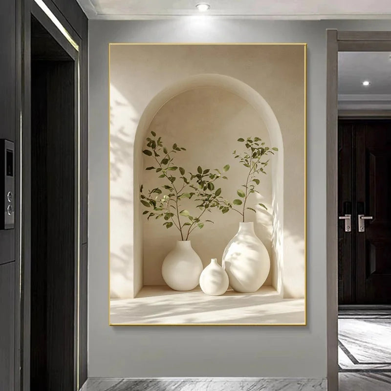 Decorative wall art of white vases and green plants in a neutral setting.