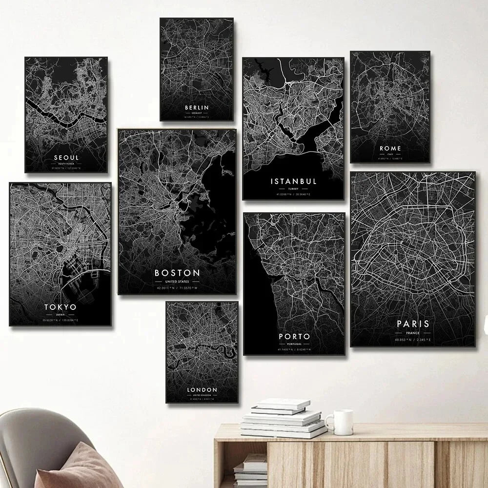 Set of black and white city map posters on a wall