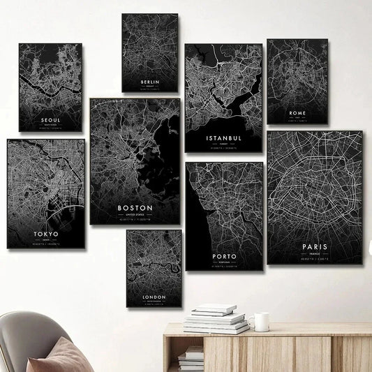 Set of black and white city map posters on a wall