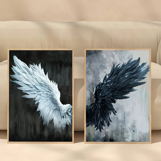Two framed artworks of angel wings on a beige sofa.