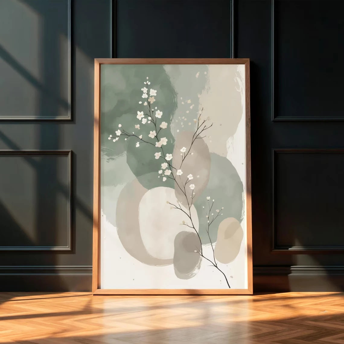 Framed artwork with abstract design on a dark paneled wall