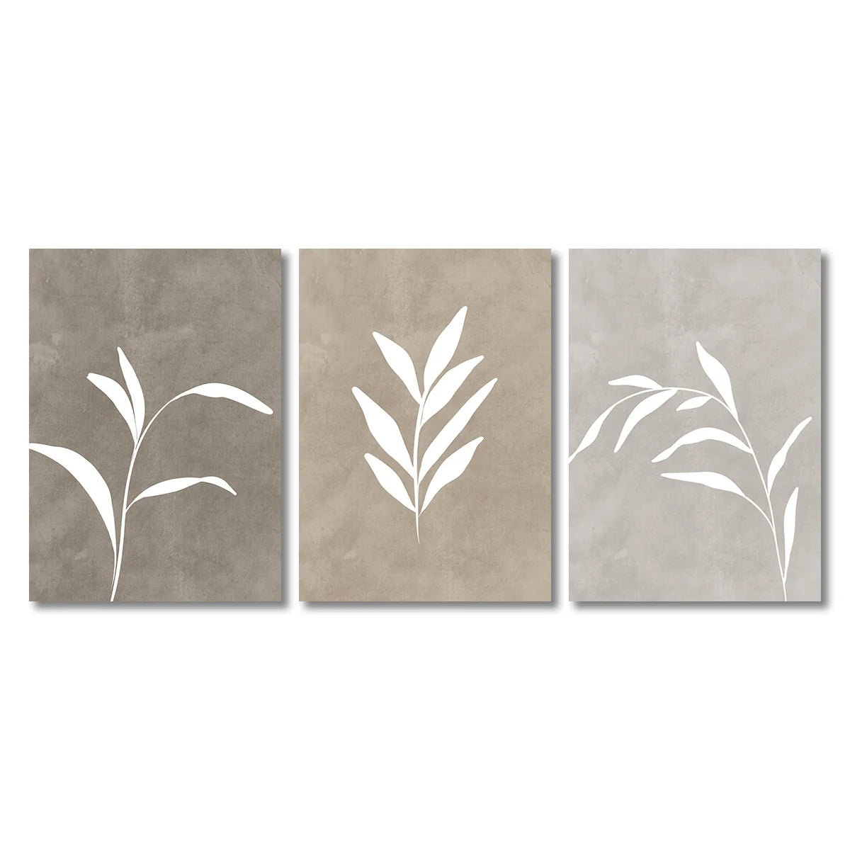 Three abstract wall art pieces with white leaf-like shapes on a beige background