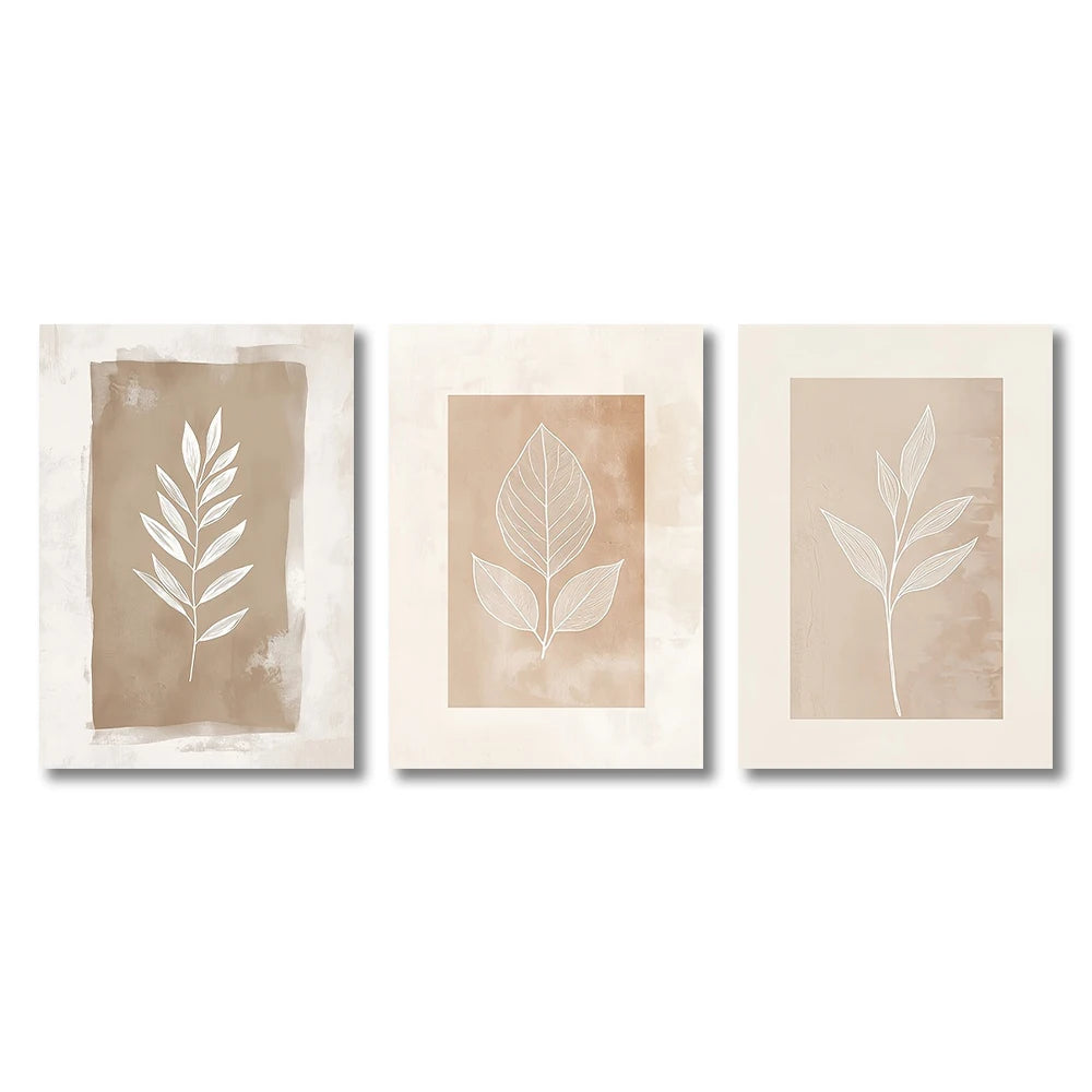 Three framed prints with leaf designs on a white background