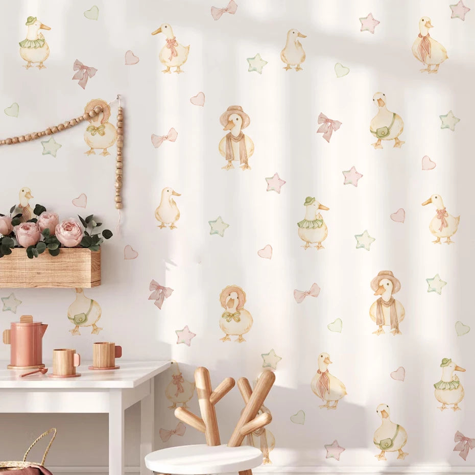 Children's room with decorative wallpaper featuring cartoon characters and plants.