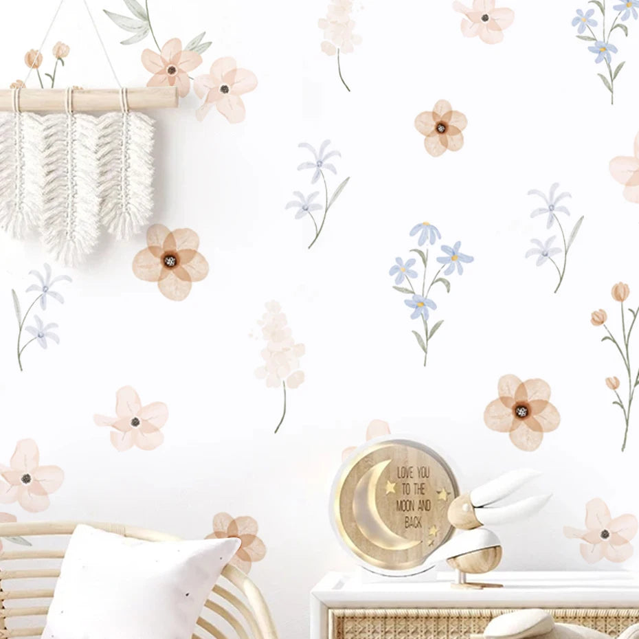 Decorative wall with floral patterns and a decorative light fixture.