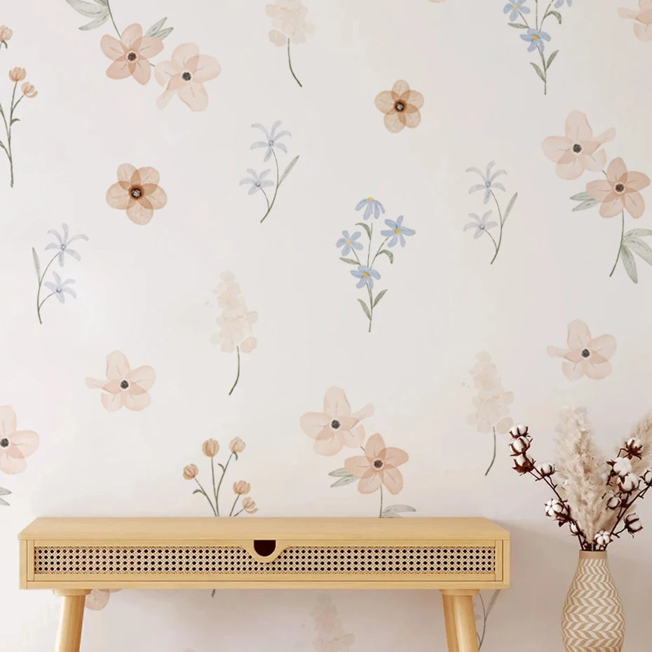 Floral wallpaper with a wooden console table and decorative vase.