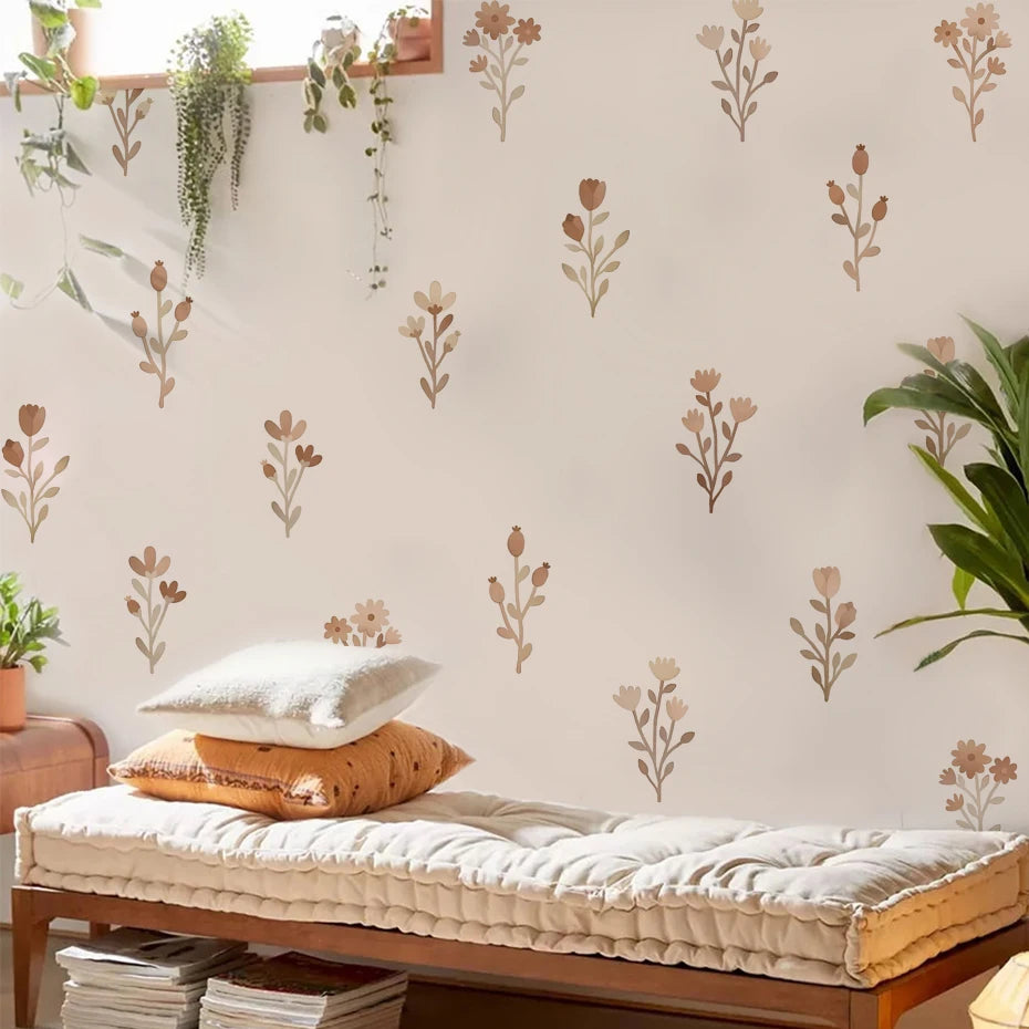 Floral wallpaper with a bench and pillows in the foreground