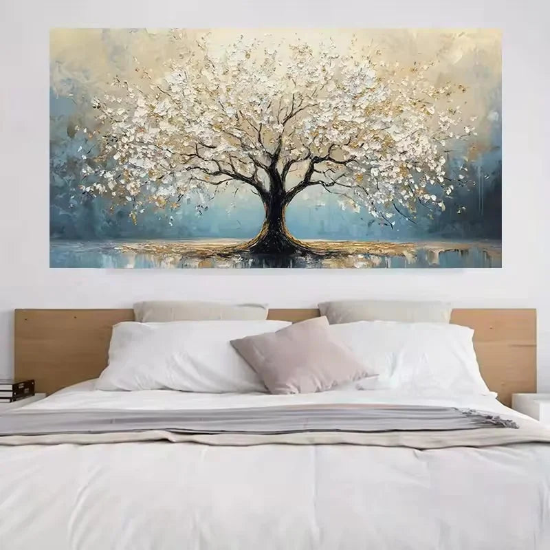 Painting of a tree with white flowers above a bed in a bedroom.