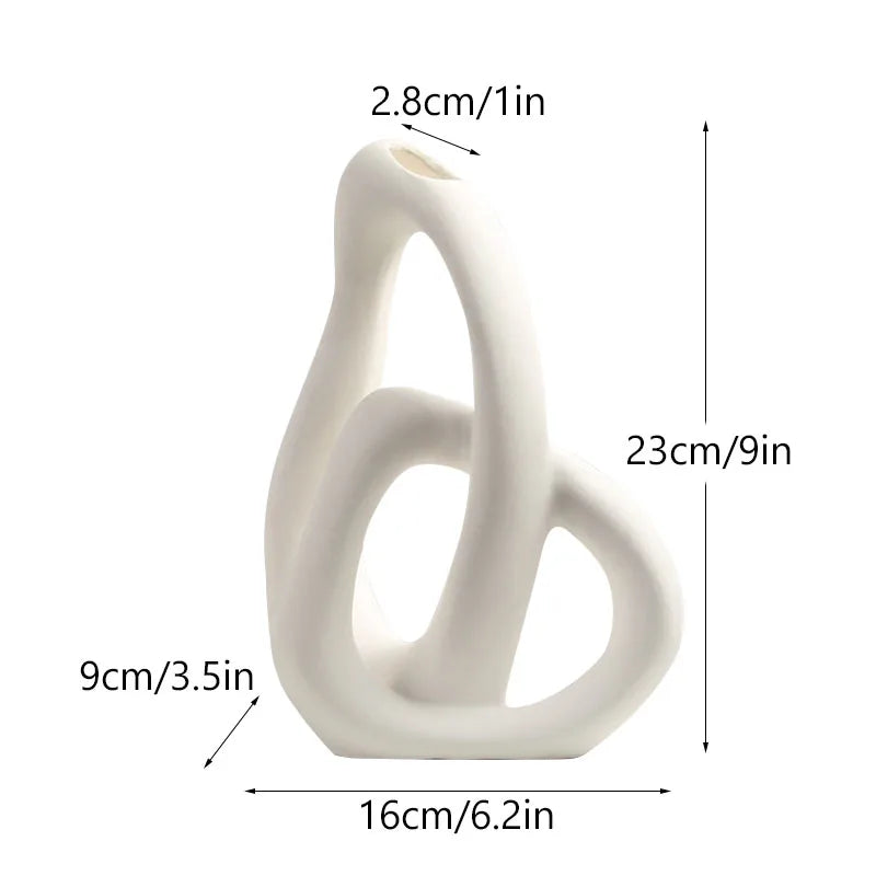 White abstract sculpture with dimensions labeled on a white background