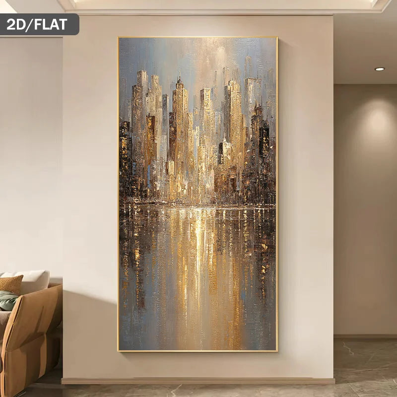 A vertical canvas painting of a city skyline with reflective water, shown hanging on a beige wall in a modern interior. The artwork features textured brushstrokes in gold, brown, gray, and blue tones, with a thin gold frame.