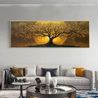 A large horizontal canvas painting of a tree with golden leaves and glowing sun-like circles in the background, displayed above a modern light gray sofa in a styled living room.