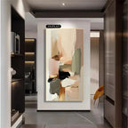 Abstract art piece on a wall in a modern interior setting