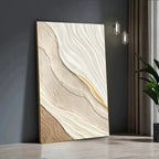 Abstract wall art with wavy beige and white pattern on a dark gray wall.