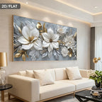 A large rectangular wall art piece with a 3D floral design featuring white magnolia-like flowers and gold leaves on a gray-blue background, displayed above a cream sofa in a modern living room.