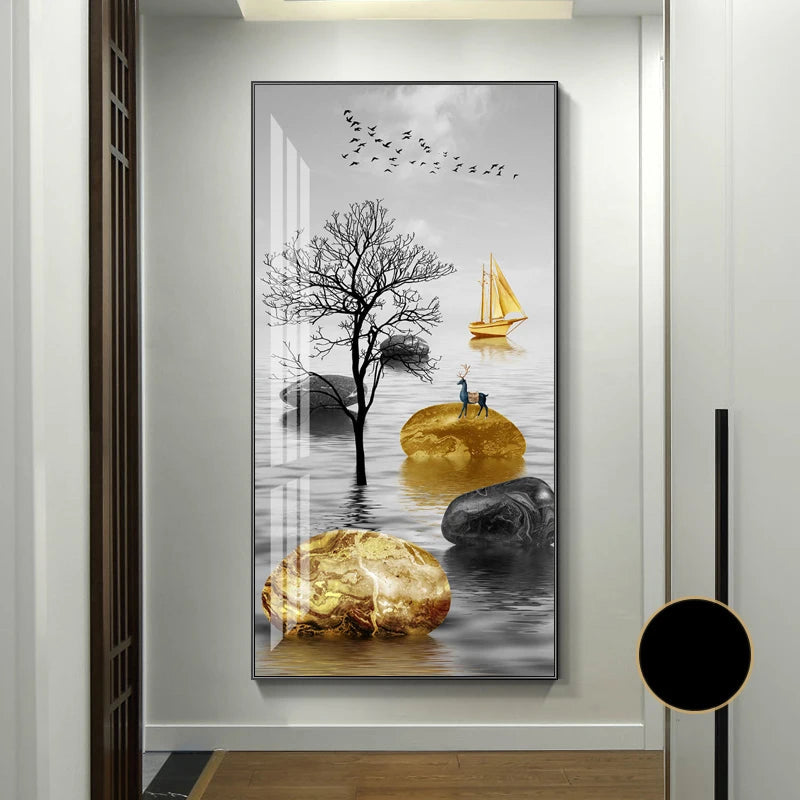 Decorative wall art with a tree, sailboat, and people on rocks in a modern interior setting.