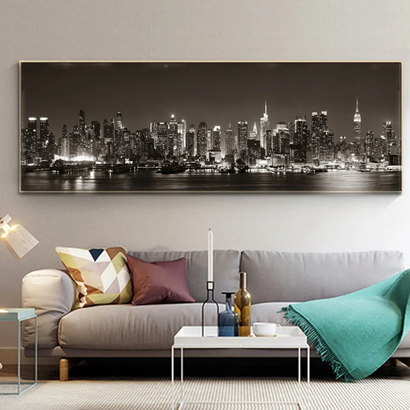 Living room with a large cityscape painting on the wall above a sofa.