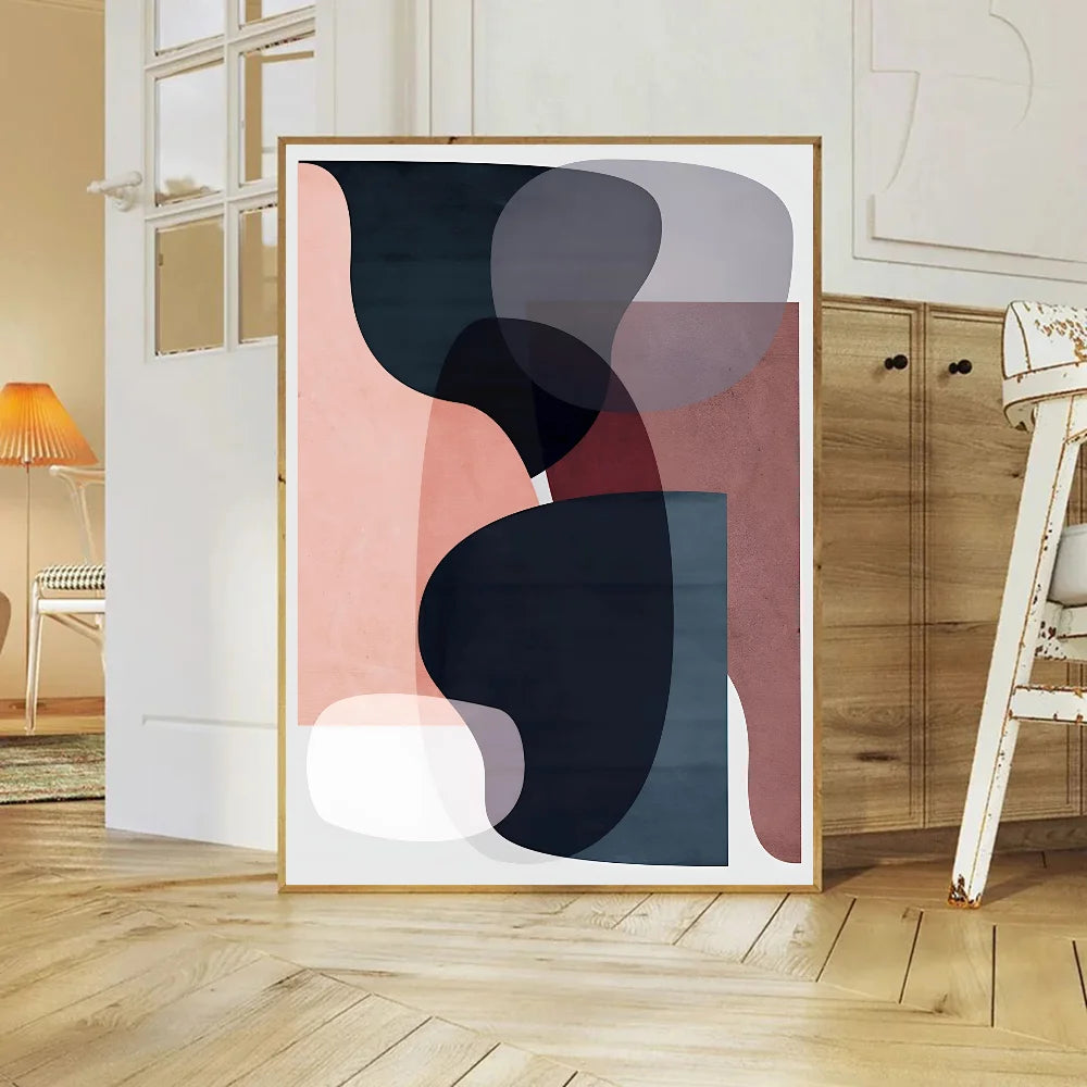 Abstract art print in a modern interior setting with wooden floor and white walls.