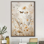 Framed artwork of flowers and butterflies on a wall above a table with decorative items.