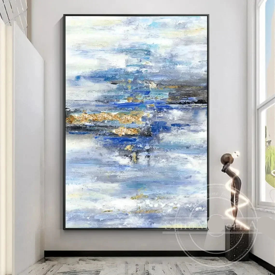 Abstract painting in a modern interior setting with a sculpture.