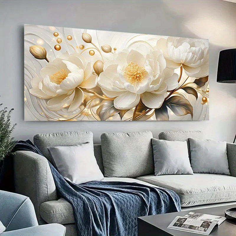 Decorative floral painting on a wall above a gray sofa in a living room.