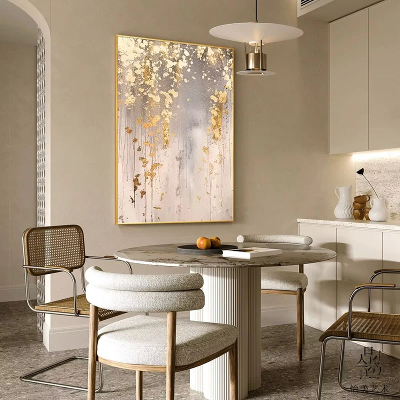 Dining room with marble table and chairs, abstract painting on wall