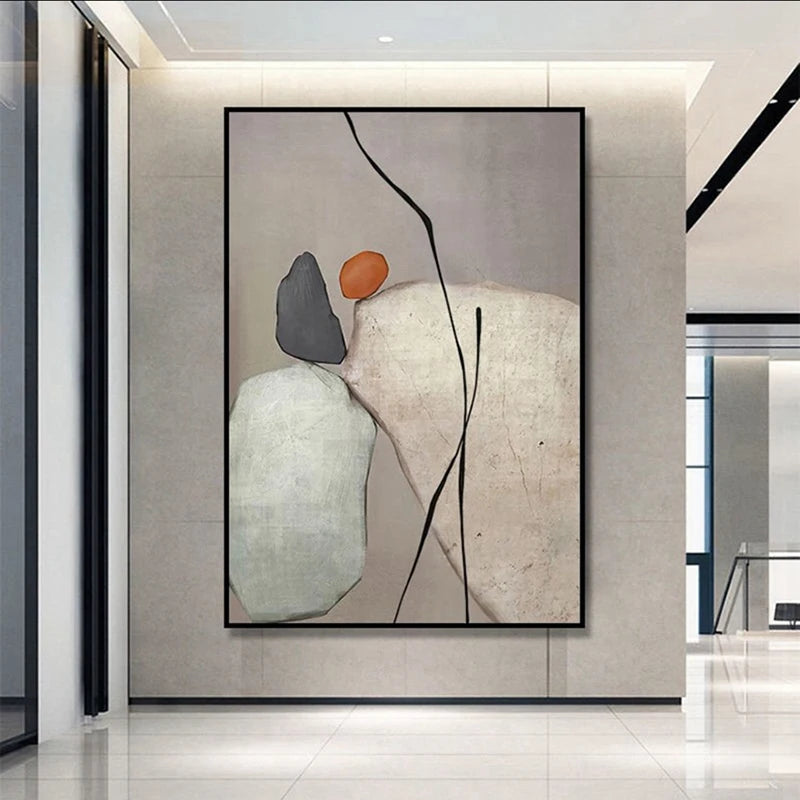 Abstract art piece on a wall in a modern interior setting