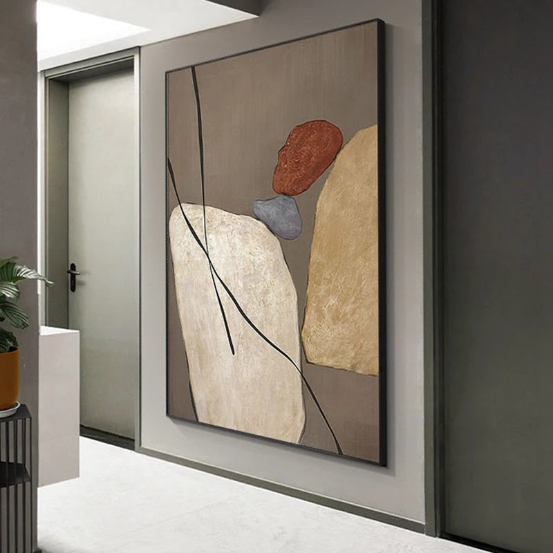 Abstract art piece on a wall in a modern interior setting
