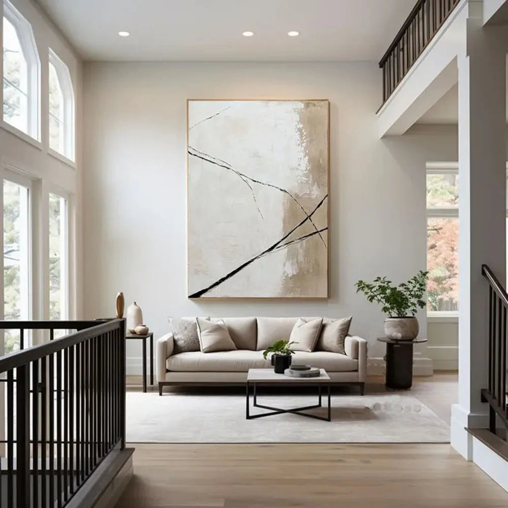 Modern living room with a large abstract painting on the wall, a sofa, and a coffee table.