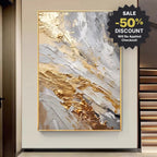 Abstract art painting with gold and gray tones on a wall, with a discount banner.