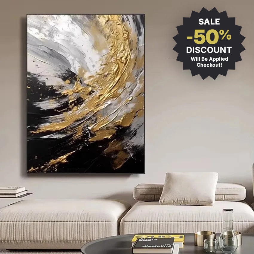 Abstract art painting with gold and black on a wall above a sofa, with a discount badge.