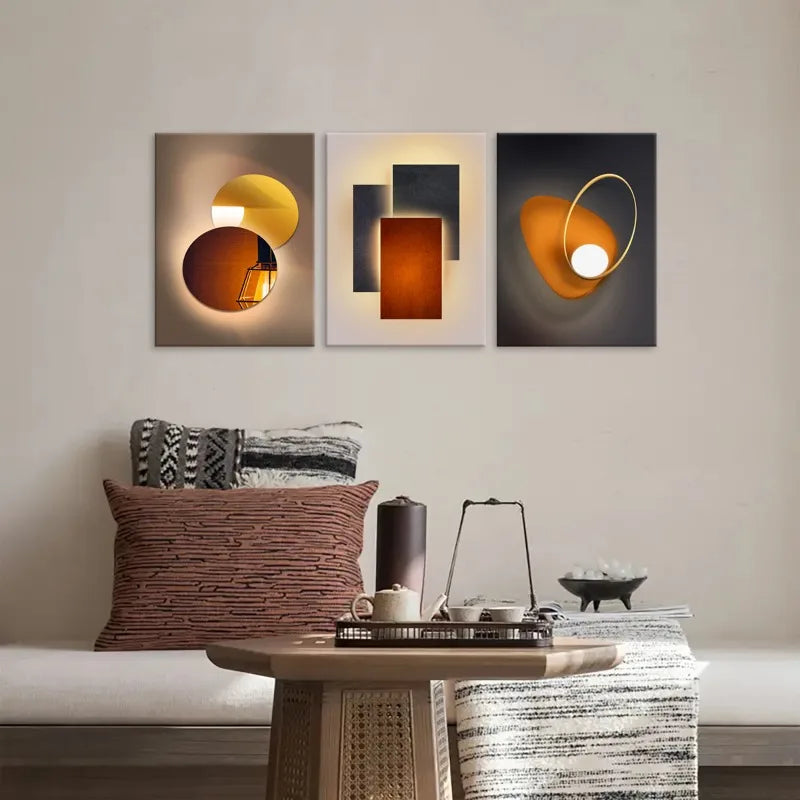 Decorative wall art above a sofa with a side table and decor items.