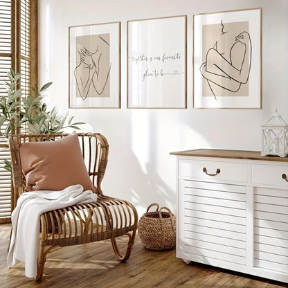 Nursery room with wicker chair, white dresser, and framed artwork on the wall.