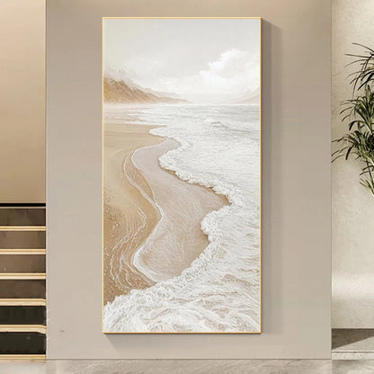Framed artwork of a beach scene on a wall.