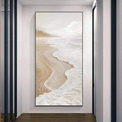 Framed artwork of a beach scene on a wall in a modern interior setting.