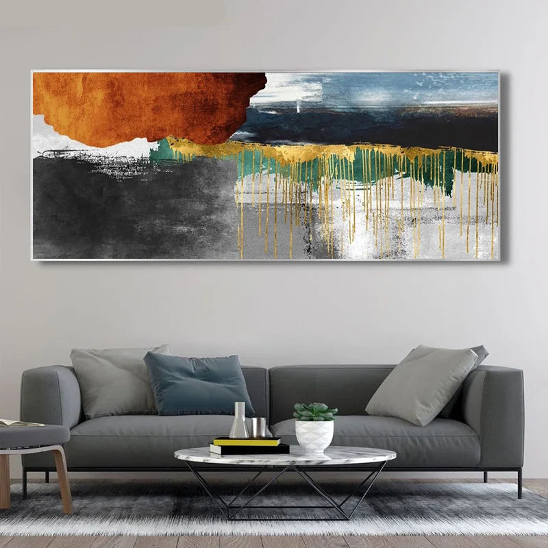 Abstract painting on a wall above a gray sofa in a living room.