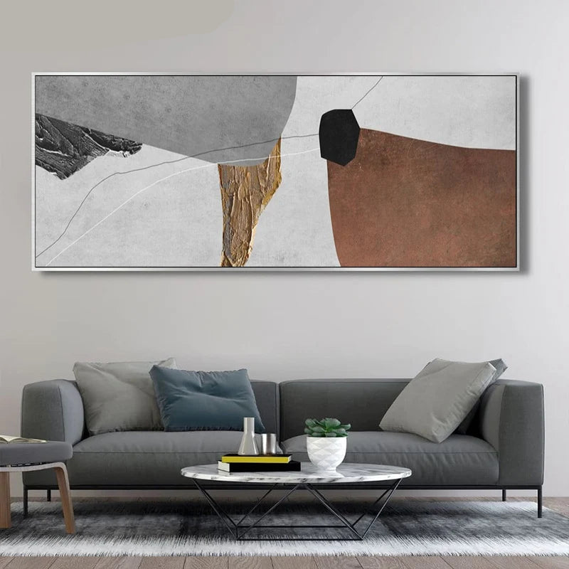 Modern living room with a gray sofa, abstract art, and a coffee table.